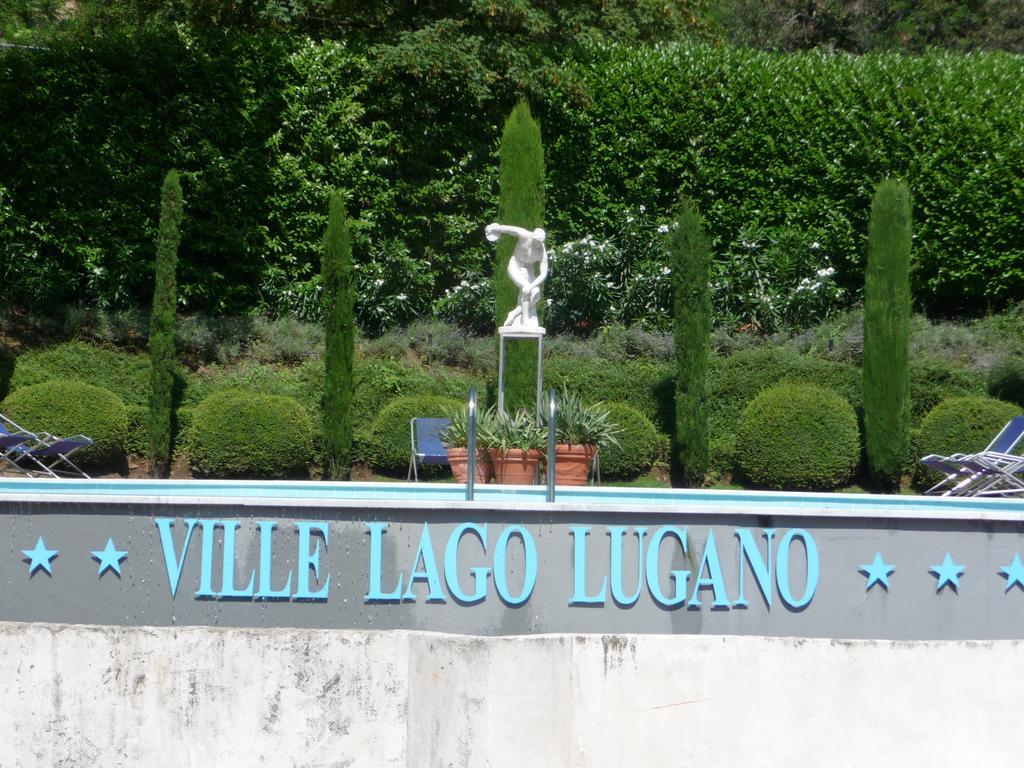 Residence Ville Lago Lugano Porto Ceresio Extérieur photo