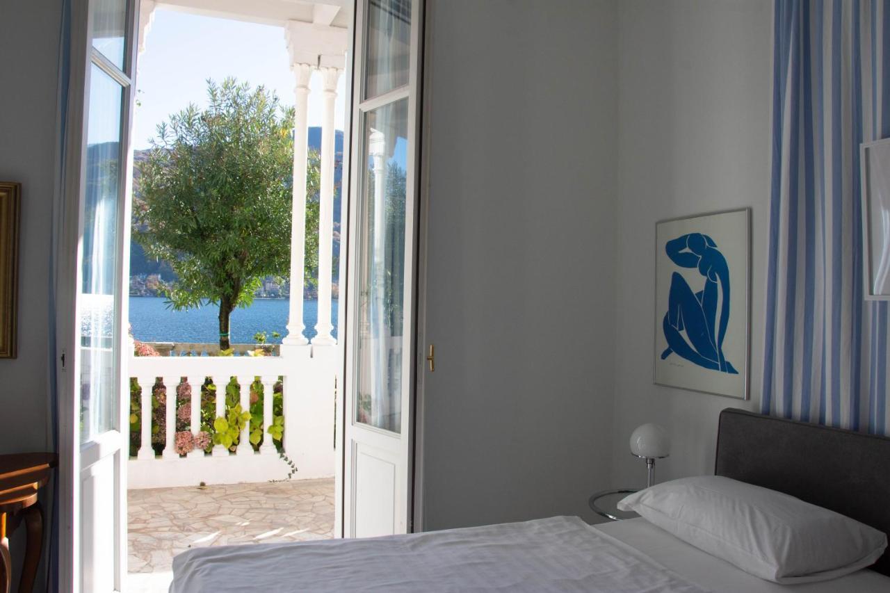 Residence Ville Lago Lugano Porto Ceresio Extérieur photo